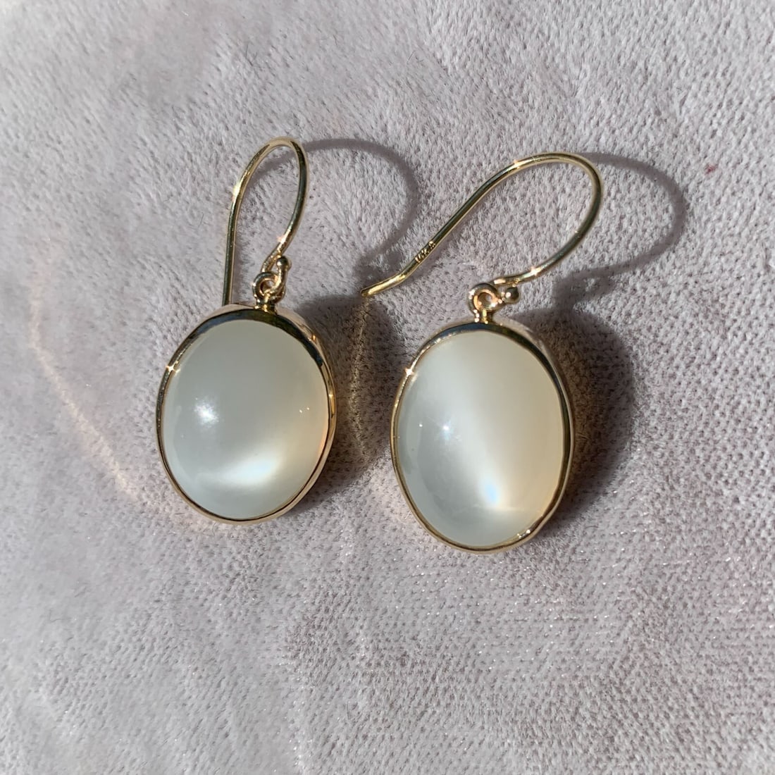 14k Yellow Gold Large Natural Moonstone Drop Earrings GIA Certified: 14k Yellow Gold Large Natural Moonstone Drop Earrings GIA Certified Illuminate your style with this stunning pair of large genuine natural moonstone drop earrings, crafted from 14k yellow gold. Each e