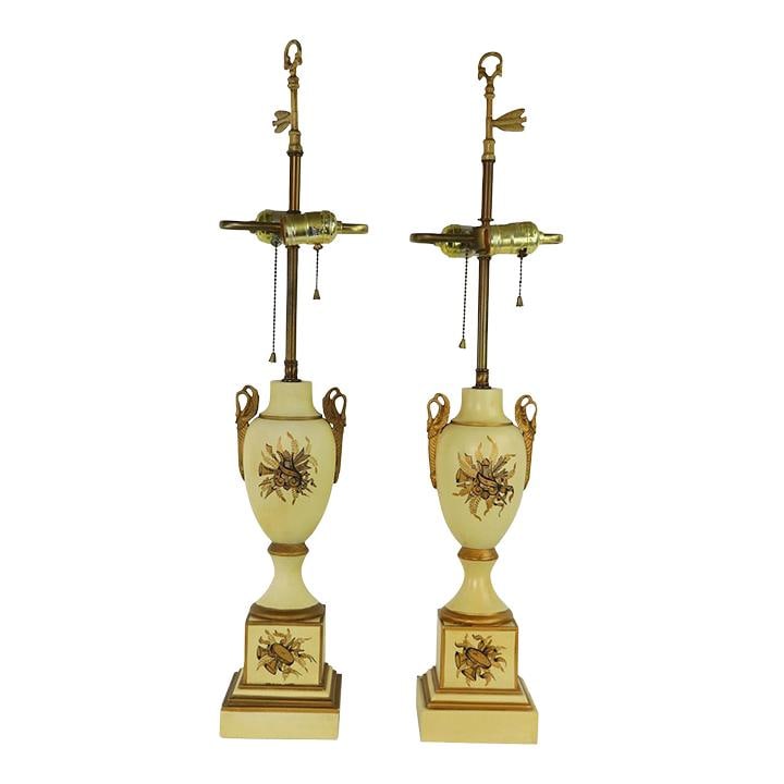 Elegant Tyndale French Empire Revival Tole Lamps Pair: Elegant Tyndale French Empire Revival Tole Lamps Pair This elegant pair of tole decorated table lamps features a classical urn form inspired by the 18th century French Empire style, crafted for the Ty
