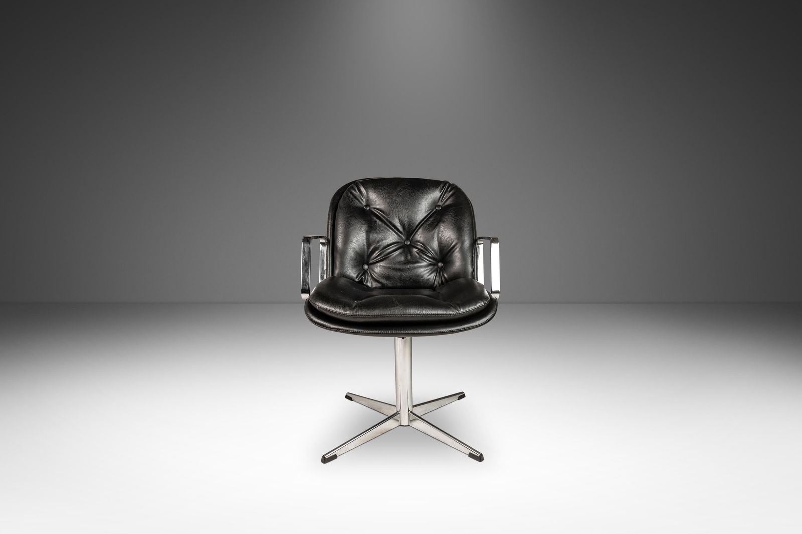 1960s Mid-Century Modern Office Chair After Charles Pollock Chrome Vinyl: 1960s Mid-Century Modern Office Chair After Charles Pollock Chrome Vinyl This Mid-Century Modern High-Stance Office Chair features a striking design inspired by Charles Pollock, crafted in the USA dur