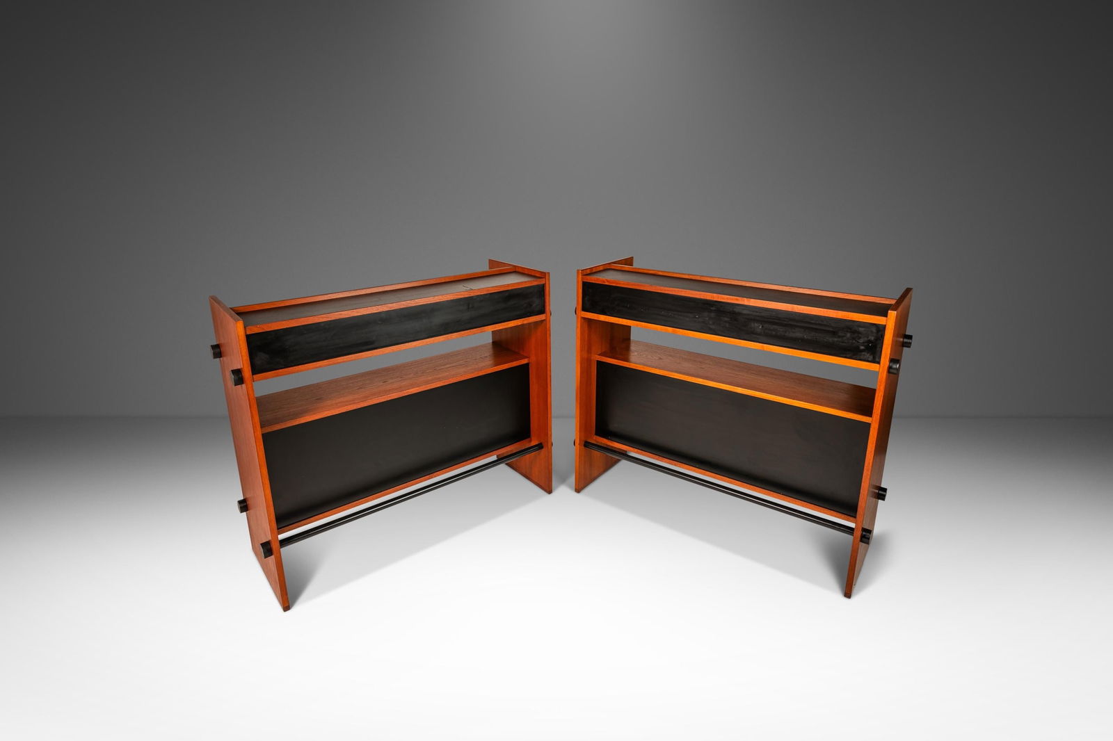 Danish Mid-Century Modern Minimalist Teak Dry Bar Set of 2 1970s: Danish Mid-Century Modern Minimalist Teak Dry Bar Set of 2 1970s Presenting a rare set of two Danish Mid-Century Modern dry bars, characterized by their minimalist design and contrasting tones. Crafte