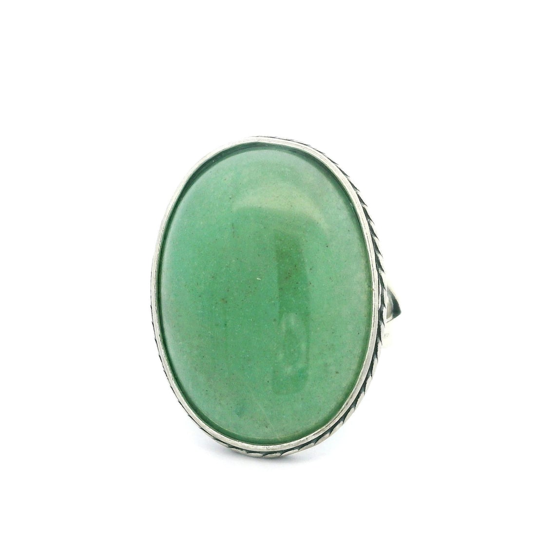 Vintage Sterling Silver Large Green Quartz Cocktail Ring Size 8: Vintage Sterling Silver Large Green Quartz Cocktail Ring Size 8 This is a stunning vintage cocktail ring featuring a large oval green quartz cabochon, beautifully bezel set in sterling silver. The nat