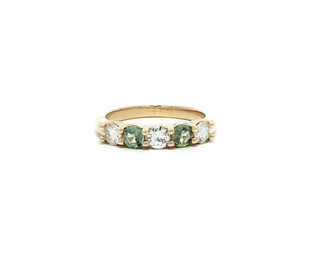 14k Yellow Gold GIA Certified Color Change Alexandrite Diamond Band Ring: 14k Yellow Gold GIA Certified Color Change Alexandrite Diamond Band Ring This exquisite 14k Yellow Gold band ring features two natural genuine Alexandrite stones, known for their captivating color cha