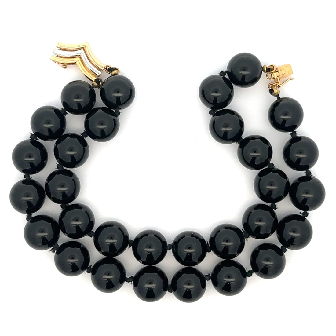 Vintage 14k Multi-Tone Gold Dual Strand Black Onyx Bead Bracelet: Vintage 14k Multi-Tone Gold Dual Strand Black Onyx Bead Bracelet This exquisite vintage bracelet features a stunning dual strand design crafted from solid 14k multi-tone gold, including yellow, rose,