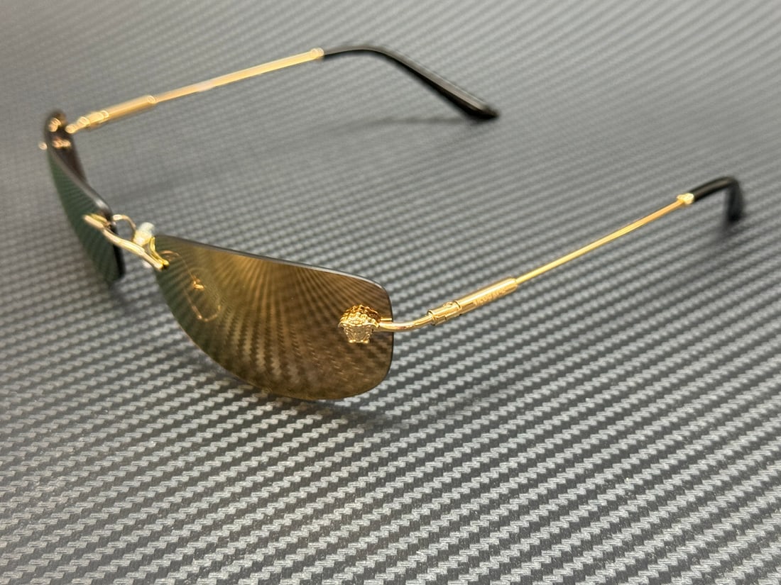 Versace VE2279 10027I Gold Frame Bronze Mirror Sunglasses for Men: Versace VE2279 10027I Gold Frame Bronze Mirror Sunglasses for Men Elevate your eyewear collection with these stunning Versace VE2279 sunglasses. Featuring a luxurious gold frame paired with bronze mir