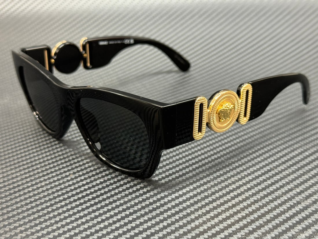 Versace VE4479U GB1 87 Men's Black Grey Sunglasses with Authenticity: Versace VE4479U GB1 87 Men's Black Grey Sunglasses with Authenticity Elevate your style with these Versace VE4479U GB1 87 sunglasses, featuring a sleek black frame and sophisticated grey lenses. Desig