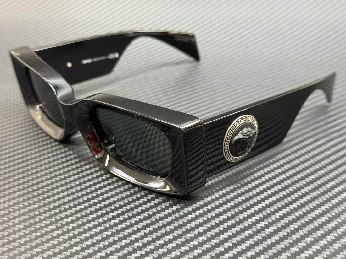 Versace VE4474U GB1 87 Black Grey Women's Sunglasses with Authenticity Certificate: Versace VE4474U GB1 87 Black Grey Women's Sunglasses with Authenticity Certificate Elevate your style with these stunning Versace VE4474U GB1 87 sunglasses. Featuring a sleek black frame paired with s