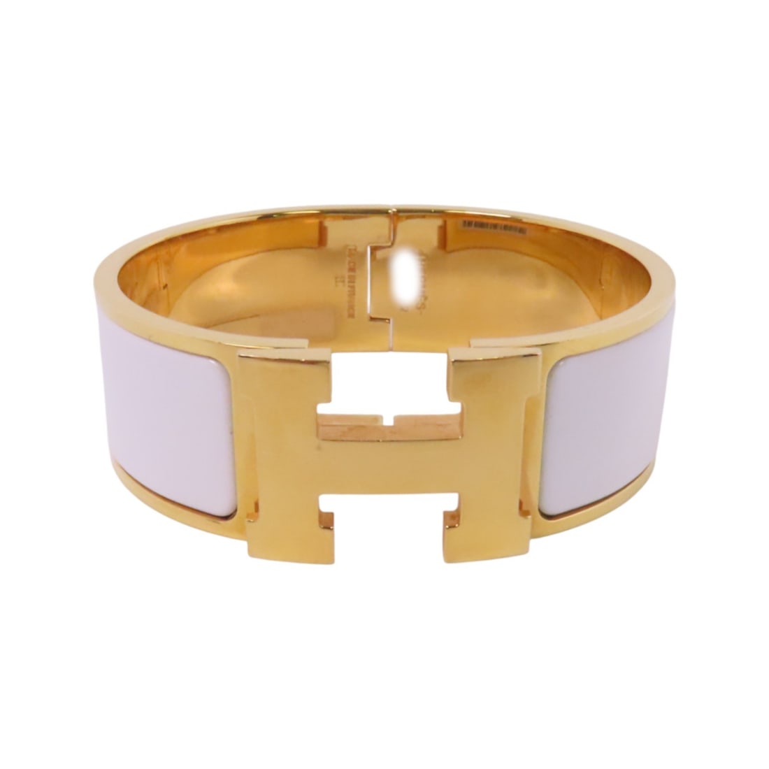 HERMES GHW Clic Clac H Enamel Bracelet White Gold Tone: HERMES GHW Clic Clac H Enamel Bracelet White Gold Tone This stunning HERMES Clic Clac H Bracelet Bangle features a chic metal and enamel design in a striking white color. Made in France, this bracelet