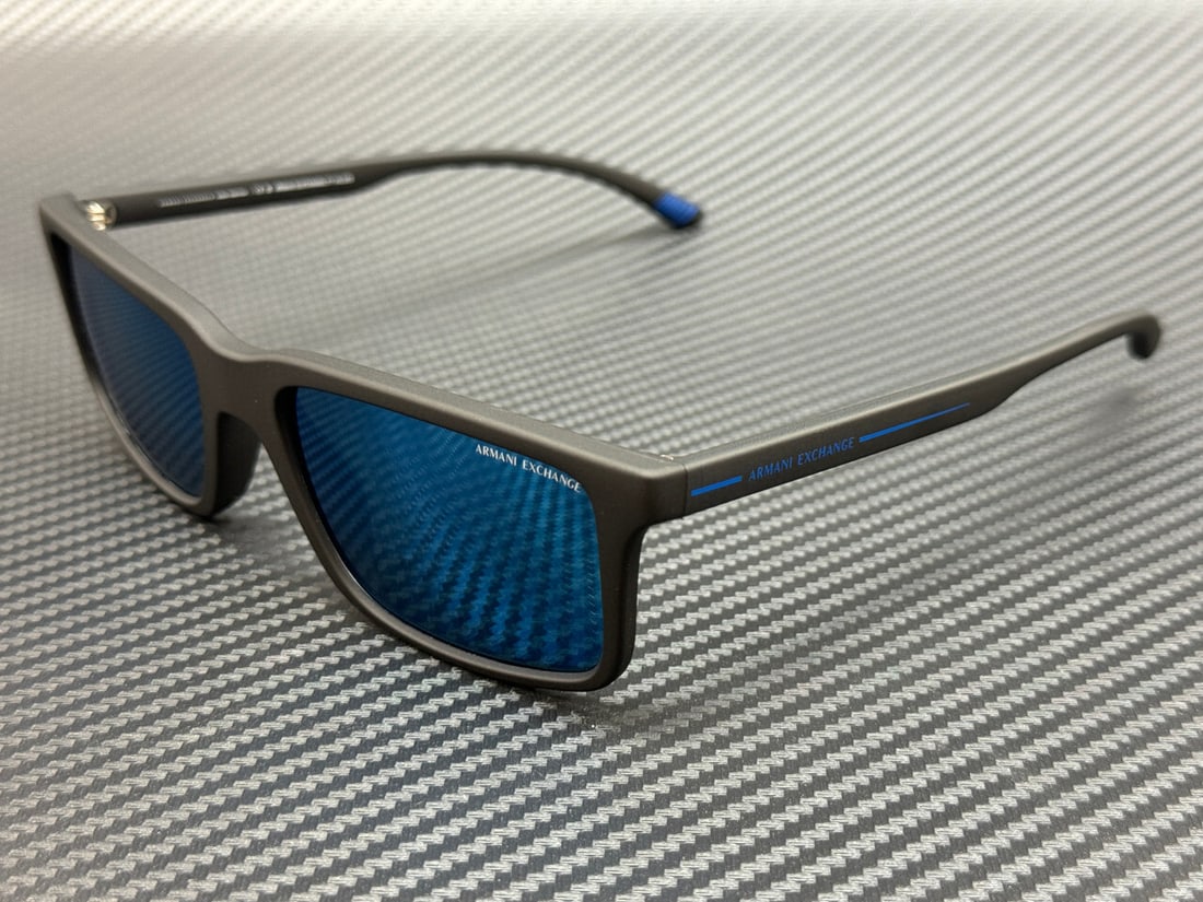 Armani Exchange AX4157SU 807855 Matte Black Blue Mirror Sunglasses: Armani Exchange AX4157SU 807855 Matte Black Blue Mirror Sunglasses Elevate your eyewear collection with these Armani Exchange AX4157SU 807855 sunglasses. Featuring a sleek matte black frame, these sun