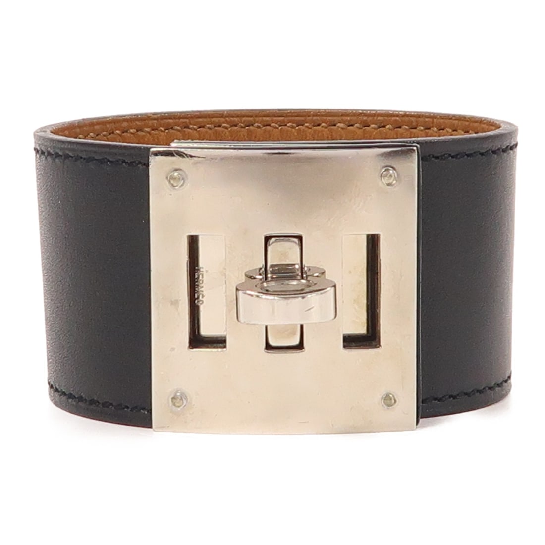 HERMES Kelly Dog Bangle Black Calfskin Leather Bracelet: HERMES Kelly Dog Bangle Black Calfskin Leather Bracelet This exquisite HERMES Kelly Dog Bracelet is a stylish bangle crafted from premium calfskin leather in a sleek black finish. Designed for regular