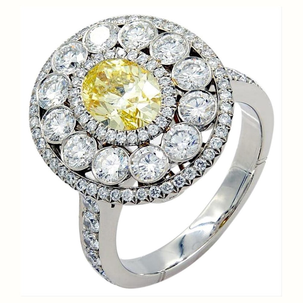 Rachel Koen Platinum 1.02ct Fancy Yellow Diamond Engagement Ring Size 6.5: Rachel Koen Platinum 1.02ct Fancy Yellow Diamond Engagement Ring Size 6.5 This exquisite engagement ring features a stunning 1.02ct oval fancy light yellow diamond with VS1 clarity, elegantly surround