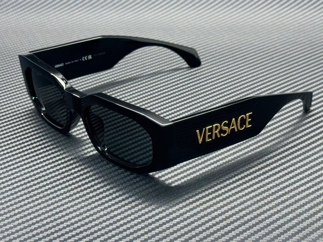 Versace VE4489U GB1 87 Black Grey 55mm Men's Sunglasses: Versace VE4489U GB1 87 Black Grey 55mm Men's Sunglasses Elevate your style with these Versace VE4489U GB1 87 sunglasses, designed for the modern man. Featuring a sleek black frame that perfectly compl