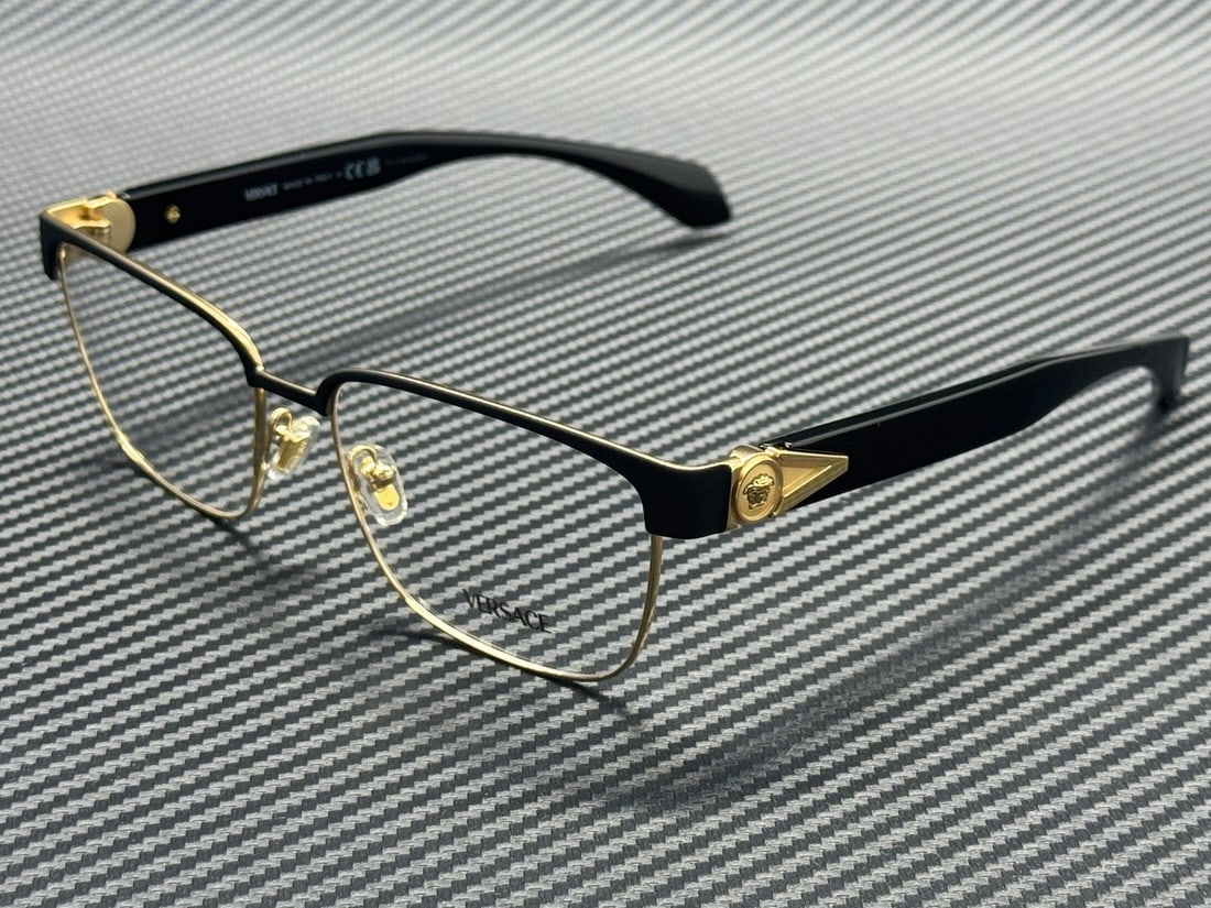 Versace VE1306 1436 Black Gold 55mm Men's Eyeglasses with Case: Versace VE1306 1436 Black Gold 55mm Men's Eyeglasses with Case Elevate your eyewear collection with these stylish Versace VE1306 1436 eyeglasses, featuring a sophisticated black and gold color scheme.