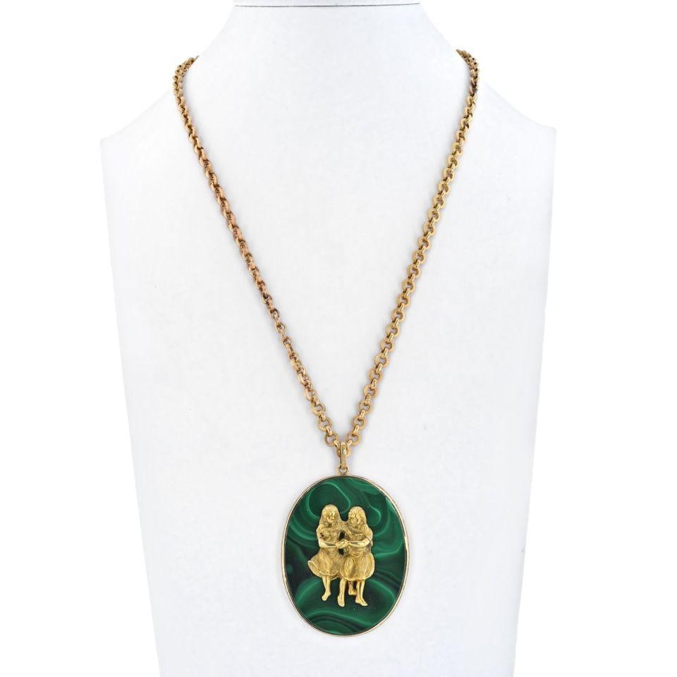 Buccellati 18K Yellow Gold Gemini Malachite Pendant Necklace: Buccellati 18K Yellow Gold Gemini Malachite Pendant Necklace This exquisite Buccellati piece showcases an 18K yellow gold Gemini malachite medallion pendant, a stunning representation of two girls hol