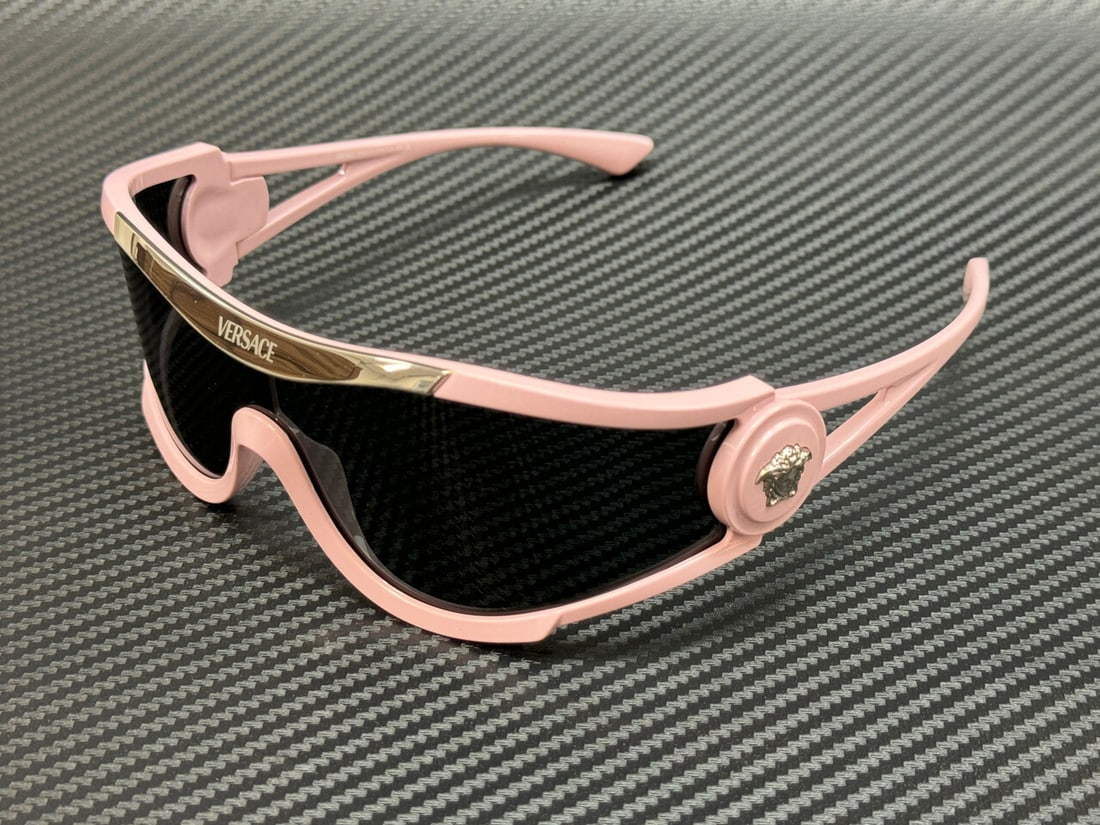 Versace VE4475 Sunglasses Pink Frame Dark Grey Lenses Unisex 60mm: Versace VE4475 Sunglasses Pink Frame Dark Grey Lenses Unisex 60mm Elevate your style with these Versace VE4475 sunglasses, featuring a striking pink frame complemented by dark grey lenses. Designed fo