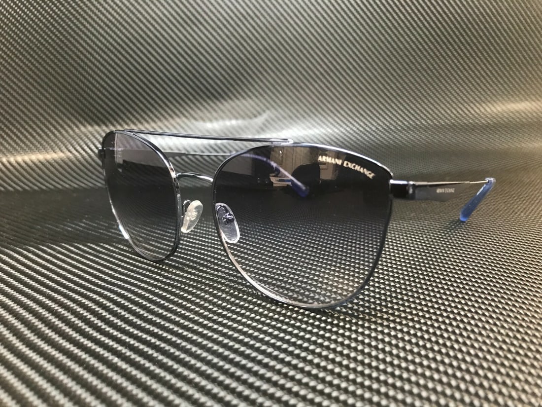 Armani Exchange AX2032S 611719 Blue Cat Eye Sunglasses: Armani Exchange AX2032S 611719 Blue Cat Eye Sunglasses Elevate your style with these Armani Exchange AX2032S 611719 Women's Sunglasses, designed with a chic cat-eye silhouette. The striking blue frame