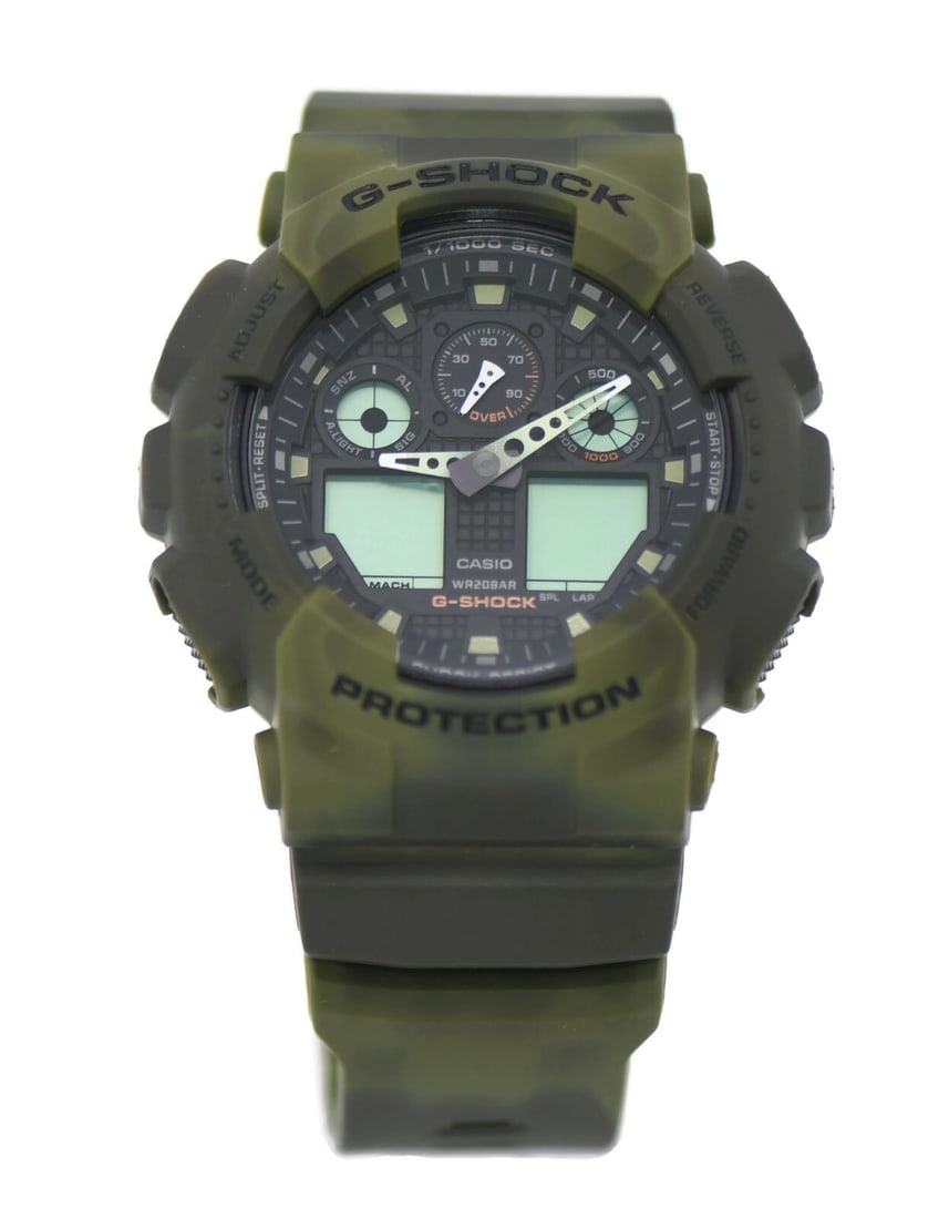 Casio G-Shock GA-100MM-3ADR Marble Camouflage Watch with Box and Papers: Casio G-Shock GA-100MM-3ADR Marble Camouflage Watch with Box and Papers Introducing the Casio G-Shock Marble Camouflage Watch GA-100MM-3ADR, a striking wristwatch designed for durability and style. Th