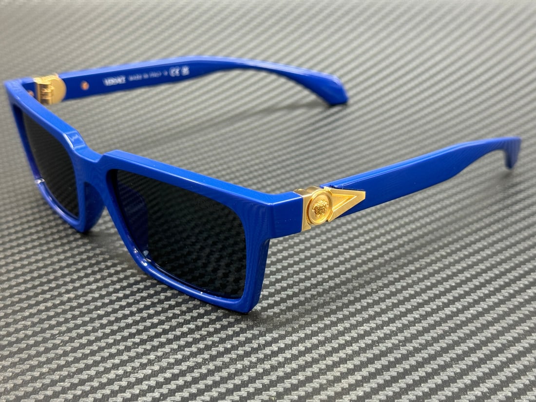 Versace VE4490U 545087 Solid Blue Grey 55mm Sunglasses with Authenticity Certificate: Versace VE4490U 545087 Solid Blue Grey 55mm Sunglasses with Authenticity Certificate Elevate your accessory game with these Versace VE4490U 545087 men's sunglasses. Featuring a chic solid blue frame t
