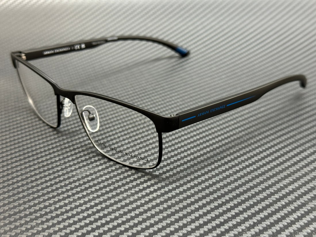 Armani Exchange AX1070 6000 Matte Black Men's Eyeglasses with Authenticity: Armani Exchange AX1070 6000 Matte Black Men's Eyeglasses with Authenticity Discover the sophistication of Armani Exchange with the AX1070 6000 eyeglasses. These stylish frames feature a sleek matte bl
