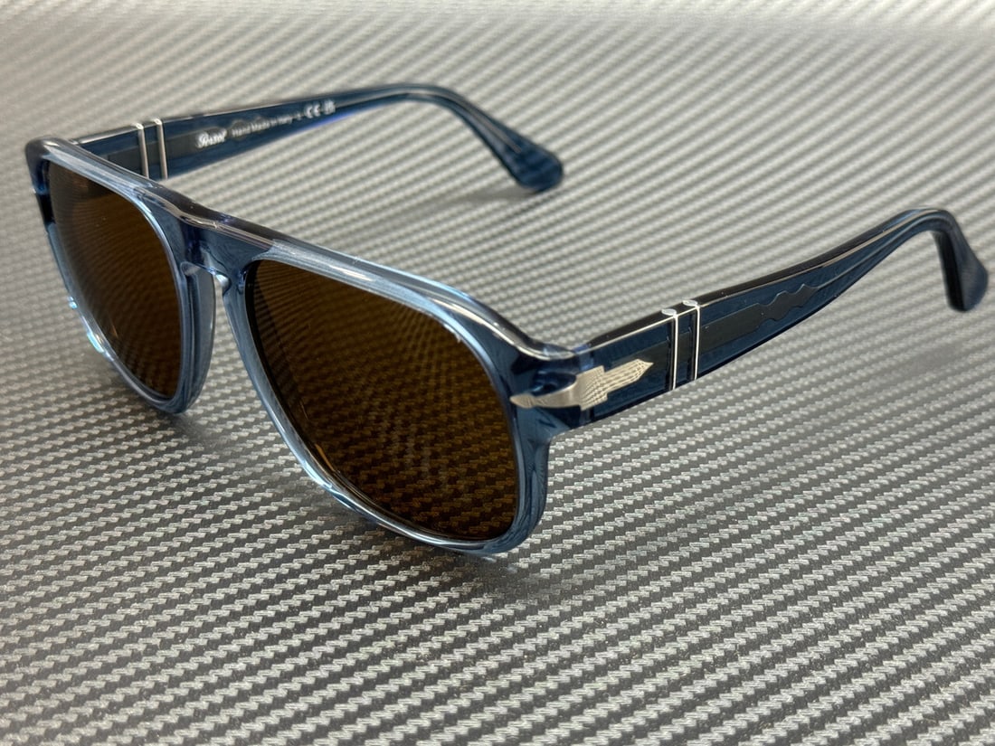 Persol PO3310S 121833 Unisex Transparent Navy Brown Sunglasses with Authenticity: Persol PO3310S 121833 Unisex Transparent Navy Brown Sunglasses with Authenticity Discover the elegance of Persol PO3310S 121833 sunglasses, designed for both men and women. These unisex sunglasses fea