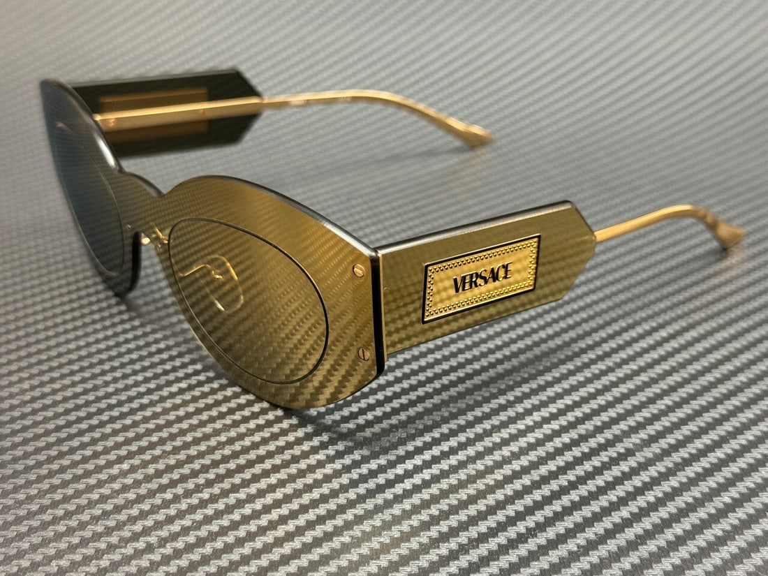 VERSACE VE2276 10027P Gold Mirror Women's Sunglasses with Authenticity Certificate: VERSACE VE2276 10027P Gold Mirror Women's Sunglasses with Authenticity Certificate Experience luxury with the VERSACE VE2276 10027P sunglasses, featuring a stunning gold mirror frame that exudes elega