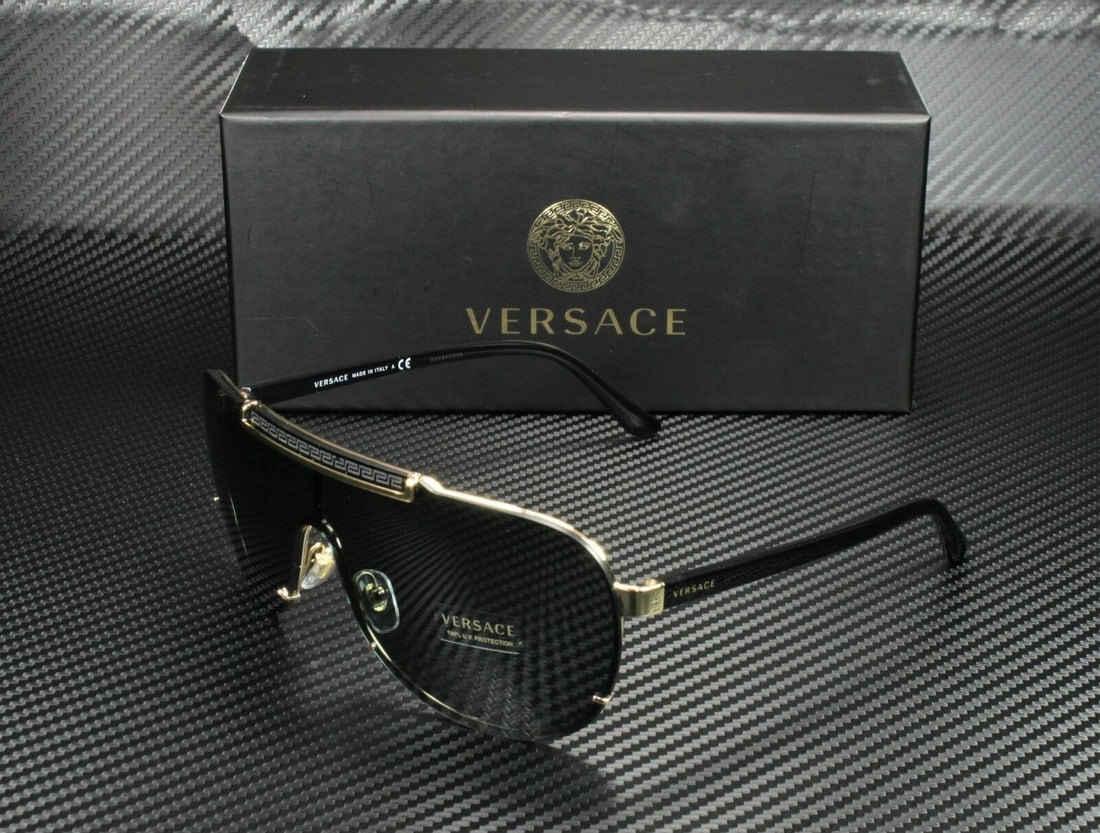 Versace VE2140 100287 Black Aviator Sunglasses with Dark Gray Lenses: Versace VE2140 100287 Black Aviator Sunglasses with Dark Gray Lenses Discover the elegance of Versace with these VE2140 100287 men's sunglasses, crafted in Italy. These aviator-style sunglasses featur