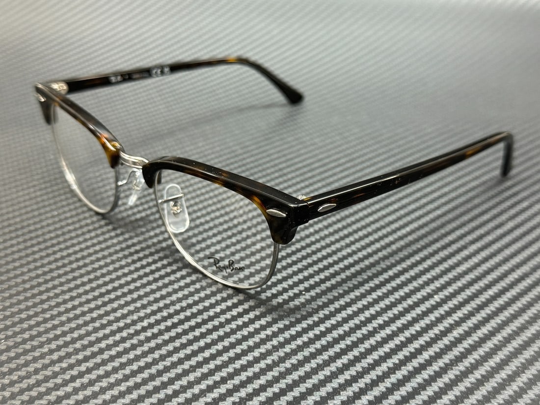 Ray-Ban RX5154 2012 Havana Brown Unisex Eyeglasses with Case: Ray-Ban RX5154 2012 Havana Brown Unisex Eyeglasses with Case Experience style and comfort with these Ray-Ban RX5154 2012 unisex eyeglasses. Featuring a sophisticated Havana Brown frame, these eyeglass