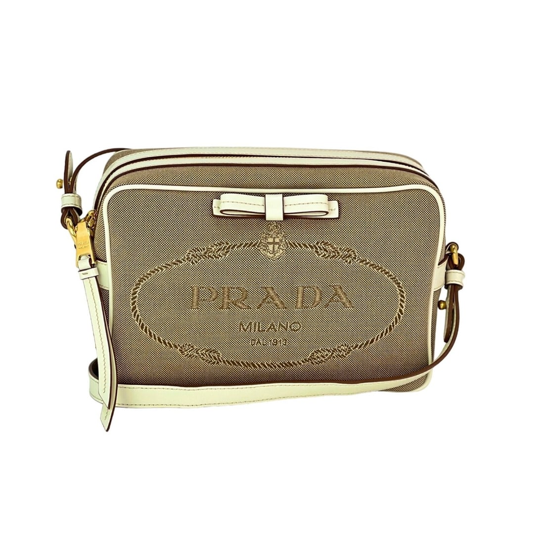 Prada Khaki Canvas Camera Crossbody Bag with Adjustable Strap: Prada Khaki Canvas Camera Crossbody Bag with Adjustable Strap Elevate your casual travel style with this Prada Khaki Canvas Camera Crossbody Bag. Designed for functionality and modern aesthetics, this