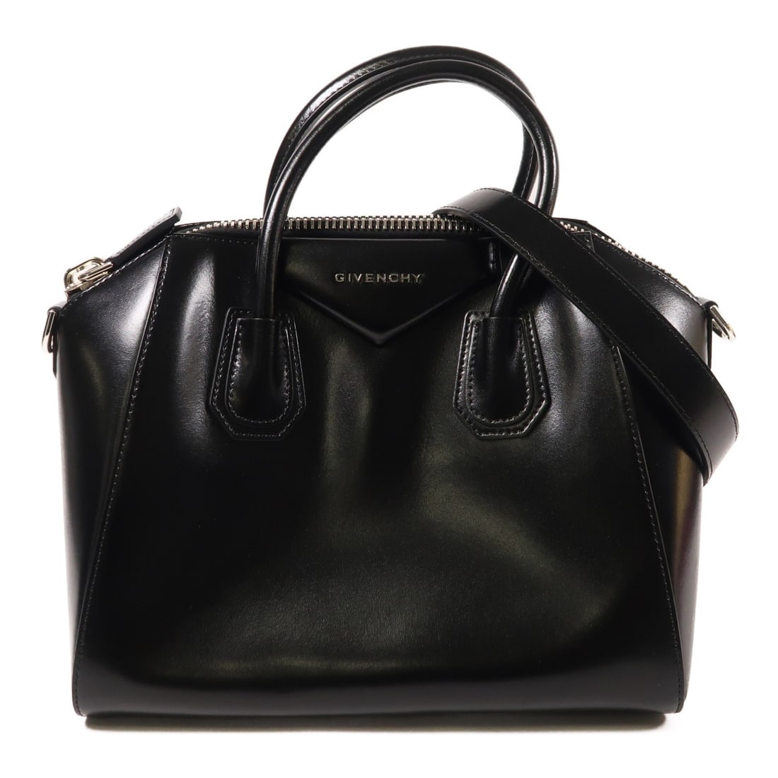 GIVENCHY Antigona 2 Way Shoulder Bag Black Calfskin Leather: GIVENCHY Antigona 2 Way Shoulder Bag Black Calfskin Leather The GIVENCHY Antigona Bag is a stylish 2-way shoulder bag crafted from premium black calfskin leather. This versatile bag features a sleek d