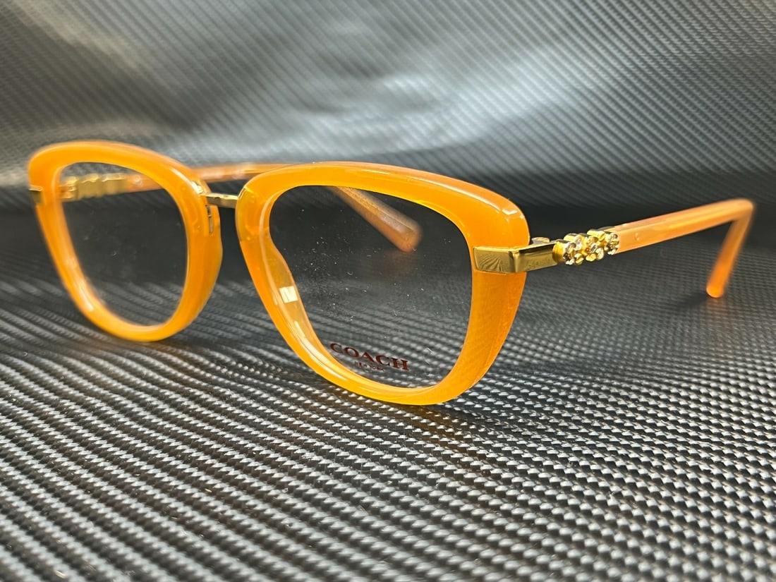 COACH HC6016B 5455 Amber Gold Square Women's Eyeglasses with Case: COACH HC6016B 5455 Amber Gold Square Women's Eyeglasses with Case Elevate your eyewear collection with these COACH HC6016B 5455 Amber Gold square eyeglasses. Designed for women, these eyeglasses featu