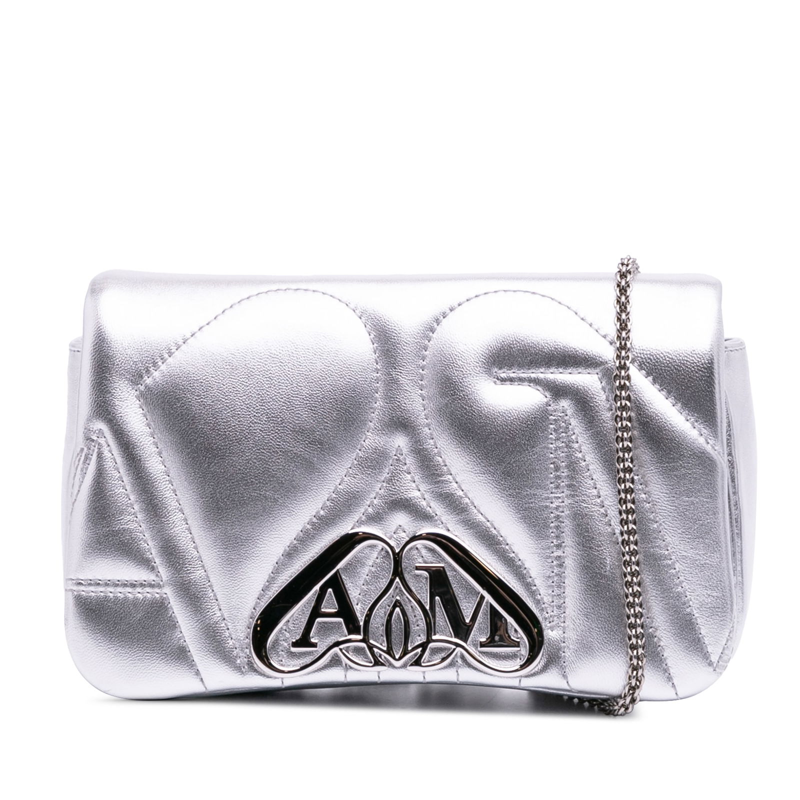 Alexander McQueen Mini Leather The Seal Silver Chain Crossbody: Alexander McQueen Mini Leather The Seal Silver Chain Crossbody This stylish crossbody bag is crafted from metallic silver leather, featuring a chic chain link strap and a front flap with a magnetic bu