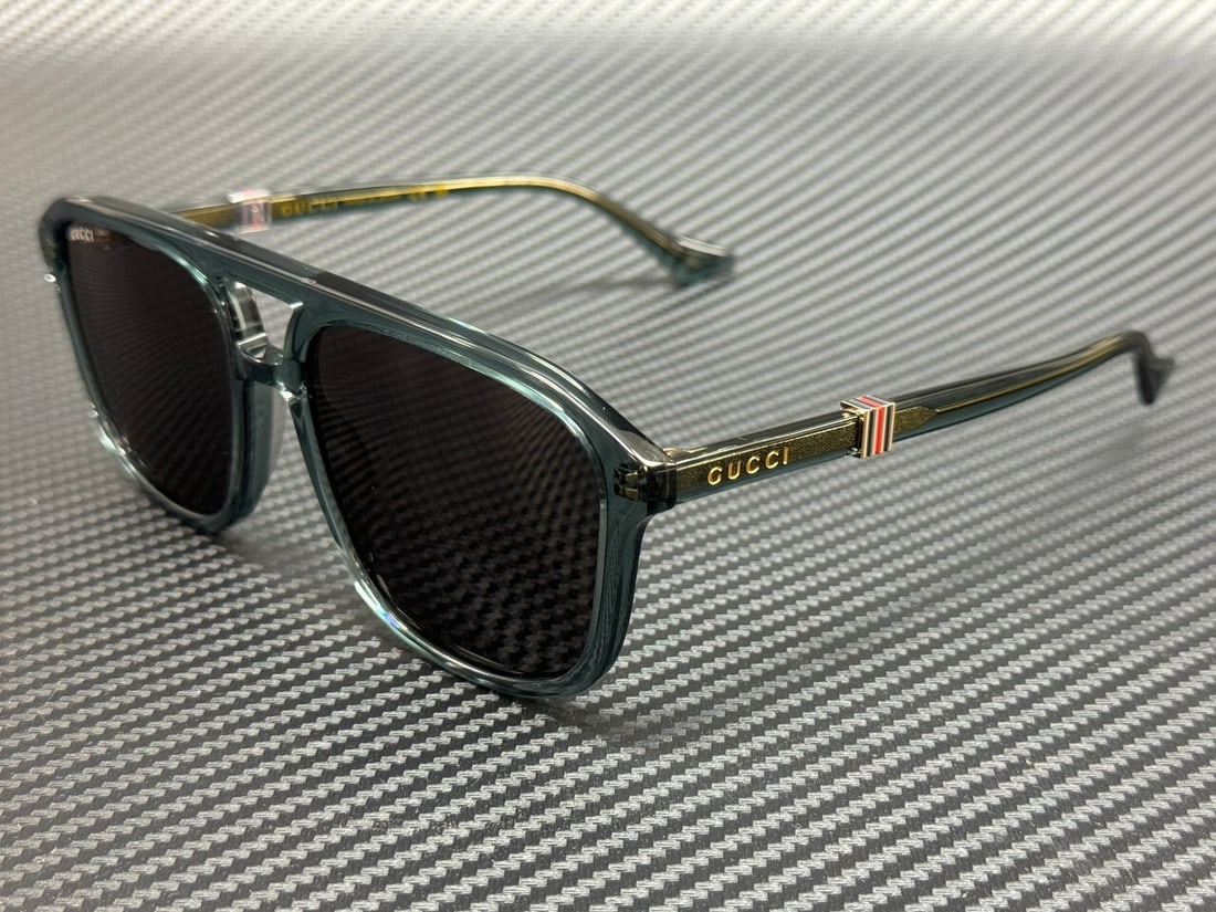 GUCCI GG1494S 003 Blue Frame Grey Lens Unisex Sunglasses with Certificate: GUCCI GG1494S 003 Blue Frame Grey Lens Unisex Sunglasses with Certificate Discover the elegance of GUCCI GG1494S 003 sunglasses, designed for a unisex fit. These stylish sunglasses feature a striking