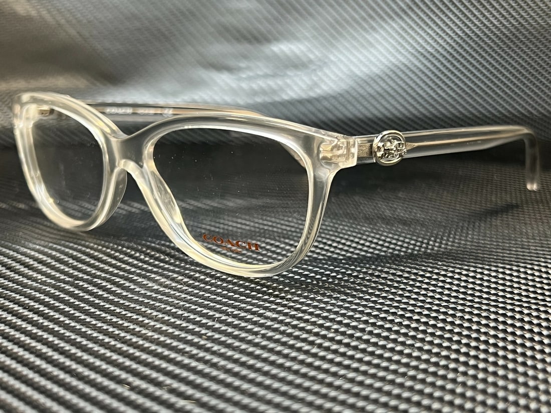 COACH HC6155 5614 Grey Women's Eyeglasses with Clear Lenses: COACH HC6155 5614 Grey Women's Eyeglasses with Clear Lenses Elevate your style with these COACH HC6155 5614 women's eyeglasses, featuring a chic grey frame that complements any outfit. Designed with c