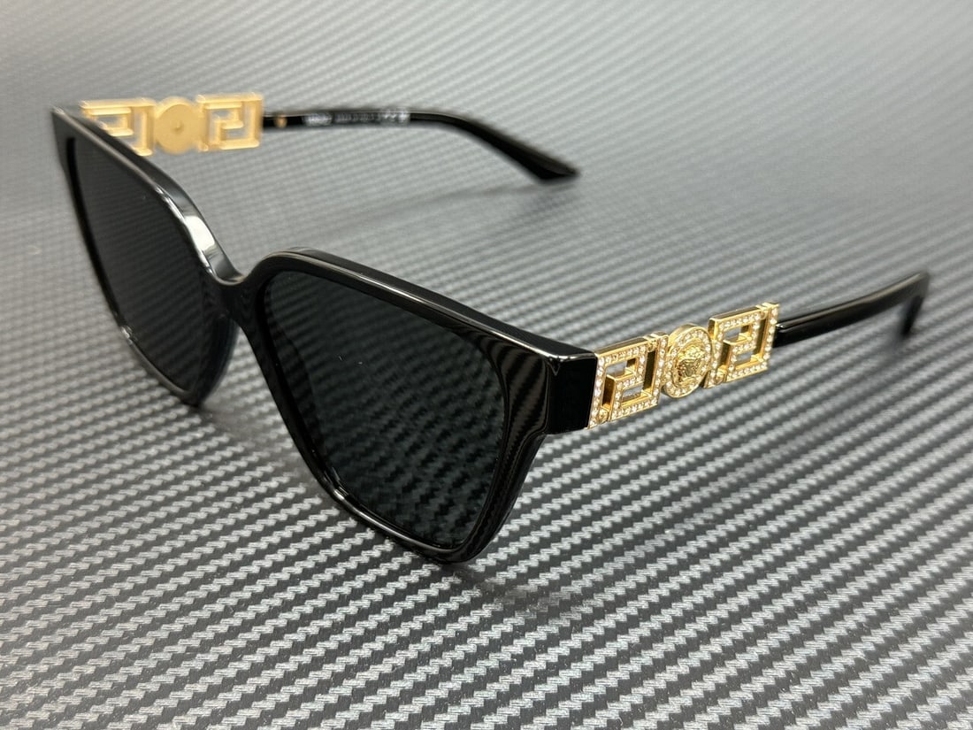Versace VE4471B GB1 87 Black Grey Women's Sunglasses with Authenticity Certificate: Versace VE4471B GB1 87 Black Grey Women's Sunglasses with Authenticity Certificate Elevate your style with these authentic Versace VE4471B GB1 87 sunglasses. With a sleek black frame and dark grey len
