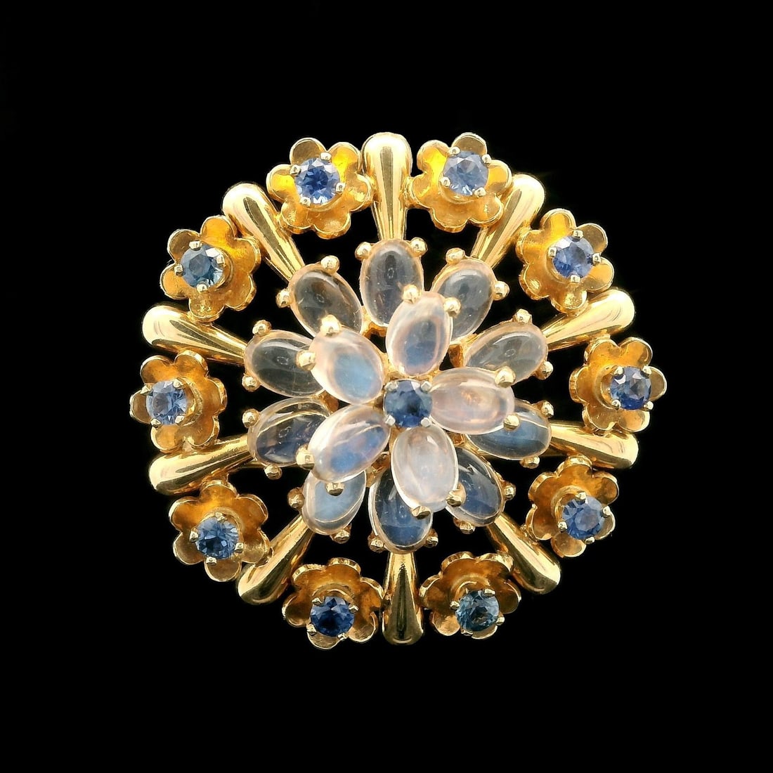 Krementz Retro 14k Gold Moonstone Montana Sapphire Pendant Brooch: Krementz Retro 14k Gold Moonstone Montana Sapphire Pendant Brooch This exquisite vintage retro brooch pendant by Krementz & Co features a stunning combination of natural gemstones, showcasing the eleg