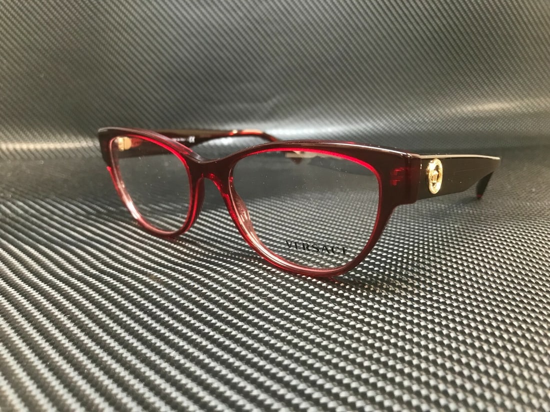 Versace VE3287 388 Red Cat Eye Eyeglasses with Certificate of Authenticity: Versace VE3287 388 Red Cat Eye Eyeglasses with Certificate of Authenticity Introducing the Versace VE3287 388 Red Transparent Women's Eyeglasses, a stunning pair that combines style and sophistication