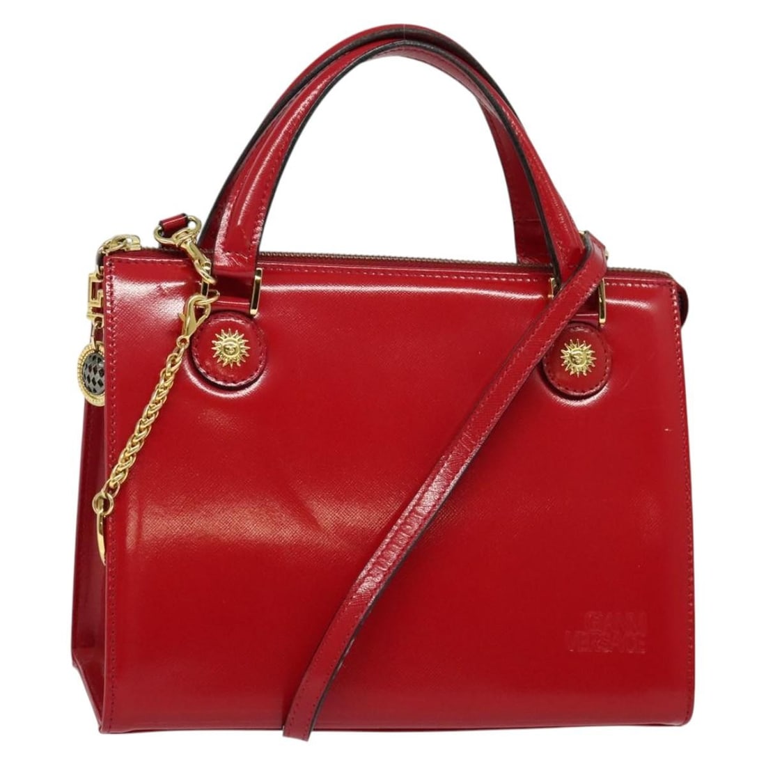 Gianni Versace Red Gold Leather 2-Way Hand Bag Authentic: Gianni Versace Red Gold Leather 2-Way Hand Bag Authentic This Gianni Versace handbag is a stunning accessory that combines luxury with practicality. Crafted from high-quality leather, it features a vi