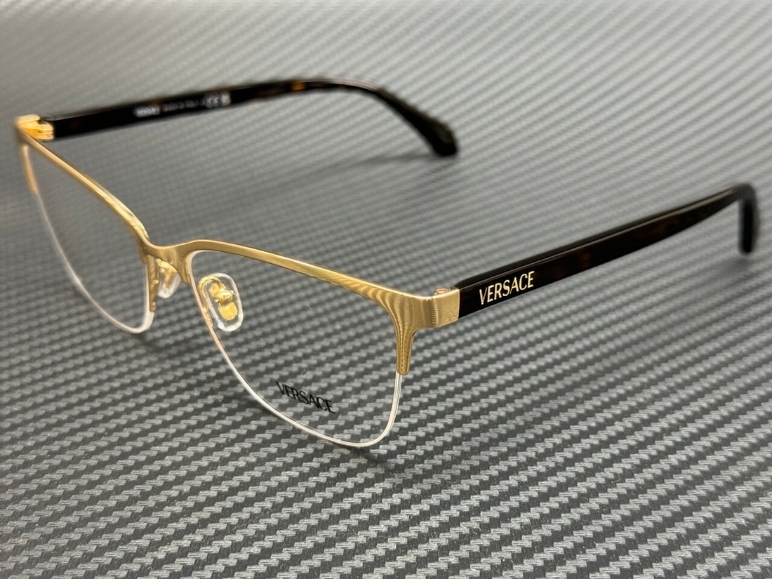 Versace VE1304 1460 Gold Havana 54mm Women's Eyeglasses with Authenticity Certificate: Versace VE1304 1460 Gold Havana 54mm Women's Eyeglasses with Authenticity Certificate Elevate your style with these Versace VE1304 1460 Gold Havana women's eyeglasses. Featuring a stunning gold frame,