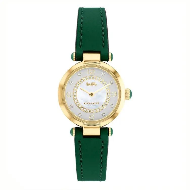 Coach Cary Ladies Quartz Watch MOP Silver Dial Gold Bezel Green Leather: Coach Cary Ladies Quartz Watch MOP Silver Dial Gold Bezel Green Leather This stunning Coach Cary wristwatch combines elegance with functionality, featuring a lustrous Mother of Pearl silver dial that