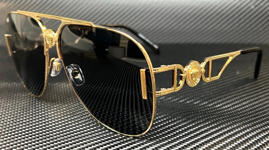 Versace VE2255 100287 Gold Grey Unisex Sunglasses with Authenticity Certificate: Versace VE2255 100287 Gold Grey Unisex Sunglasses with Authenticity Certificate Elevate your style with these stunning Versace VE2255 sunglasses. Featuring a luxurious gold frame, these unisex sunglas