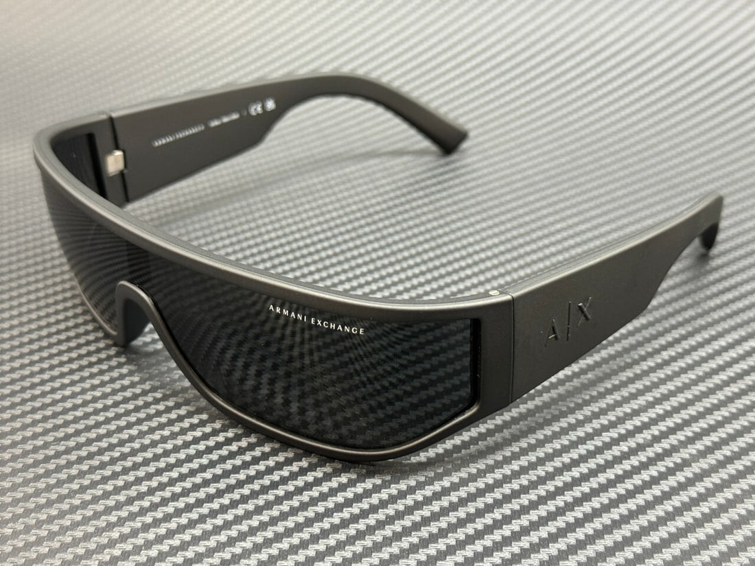 Armani Exchange AX4153SU 805887 Matte Black Grey 70mm Sunglasses with Box and Certificate: Armani Exchange AX4153SU 805887 Matte Black Grey 70mm Sunglasses with Box and Certificate Elevate your style with these Armani Exchange AX4153SU sunglasses, featuring a sleek matte black frame paired
