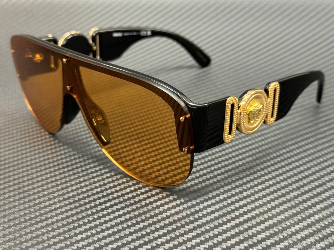 Versace VE4391 GB1 7 Black Frame Orange Lenses Men's Sunglasses with Authenticity Certificate: Versace VE4391 GB1 7 Black Frame Orange Lenses Men's Sunglasses with Authenticity Certificate Elevate your style with these Versace VE4391 GB1 7 sunglasses, featuring a striking black frame complement