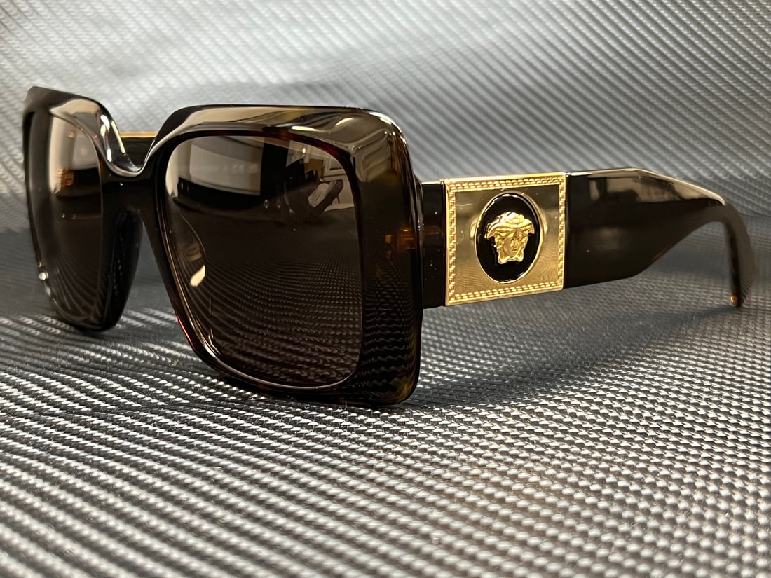 Versace VE4405 108 73 Havana Rectangle Women's Sunglasses with Brown Lenses: Versace VE4405 108 73 Havana Rectangle Women's Sunglasses with Brown Lenses Enhance your style with these exquisite Versace VE4405 sunglasses, featuring a sophisticated Havana rectangle design. Constr