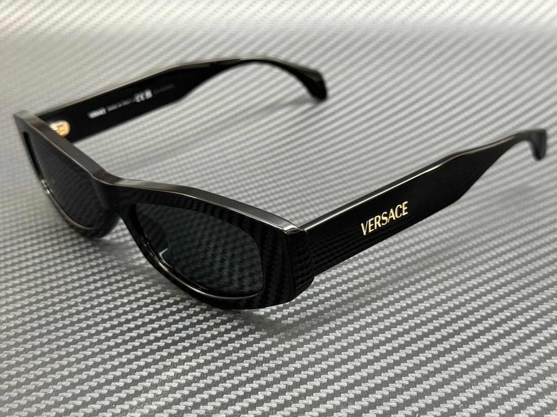 Versace VE4487 GB1 87 Black Grey 54mm Women's Sunglasses with Authenticity Certificate: Versace VE4487 GB1 87 Black Grey 54mm Women's Sunglasses with Authenticity Certificate Step out in style with these Versace VE4487 GB1 87 sunglasses. Featuring a sleek black frame, these women's sungl