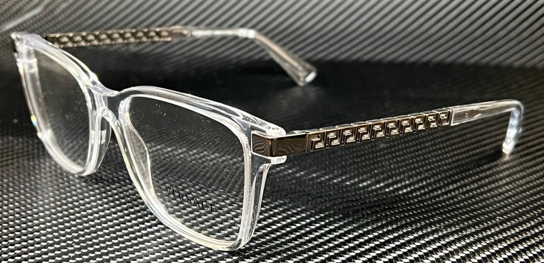 Versace VE3340U 148 Clear Eyeglasses with Authenticity Certificate: Versace VE3340U 148 Clear Eyeglasses with Authenticity Certificate Discover the elegance of Versace with these VE3340U 148 clear eyeglasses, designed for men who appreciate style and sophistication. T