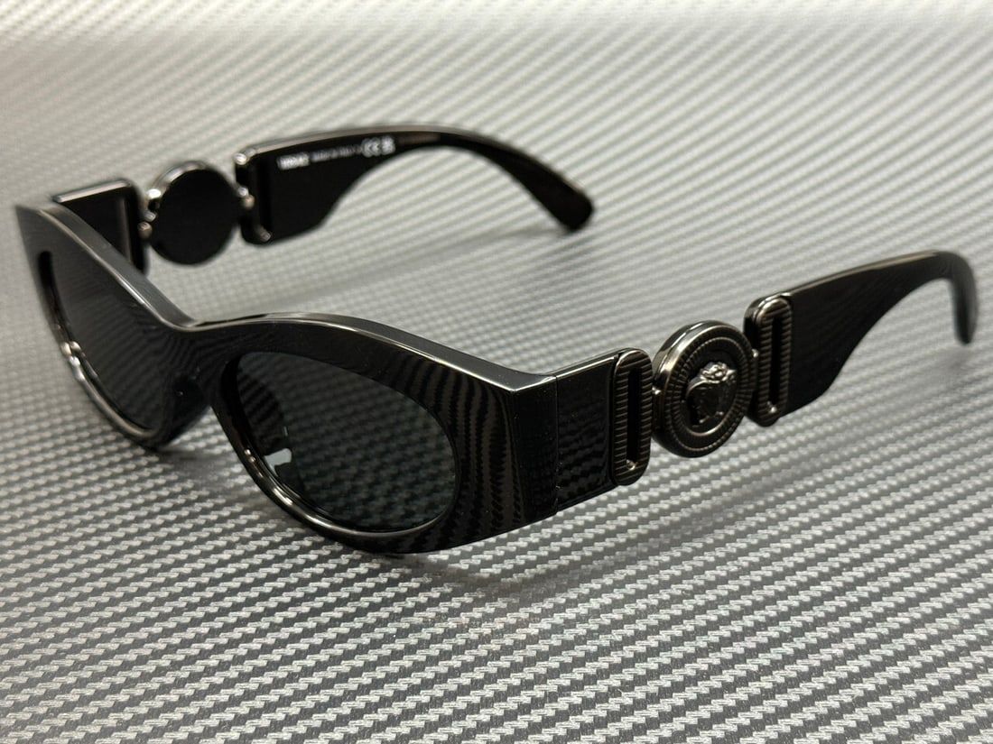 Versace VE4480U 536087 Black Grey Women's Sunglasses with Authenticity Certificate: Versace VE4480U 536087 Black Grey Women's Sunglasses with Authenticity Certificate Introducing the Versace VE4480U 536087 sunglasses, a perfect blend of elegance and functionality. These women's sungl