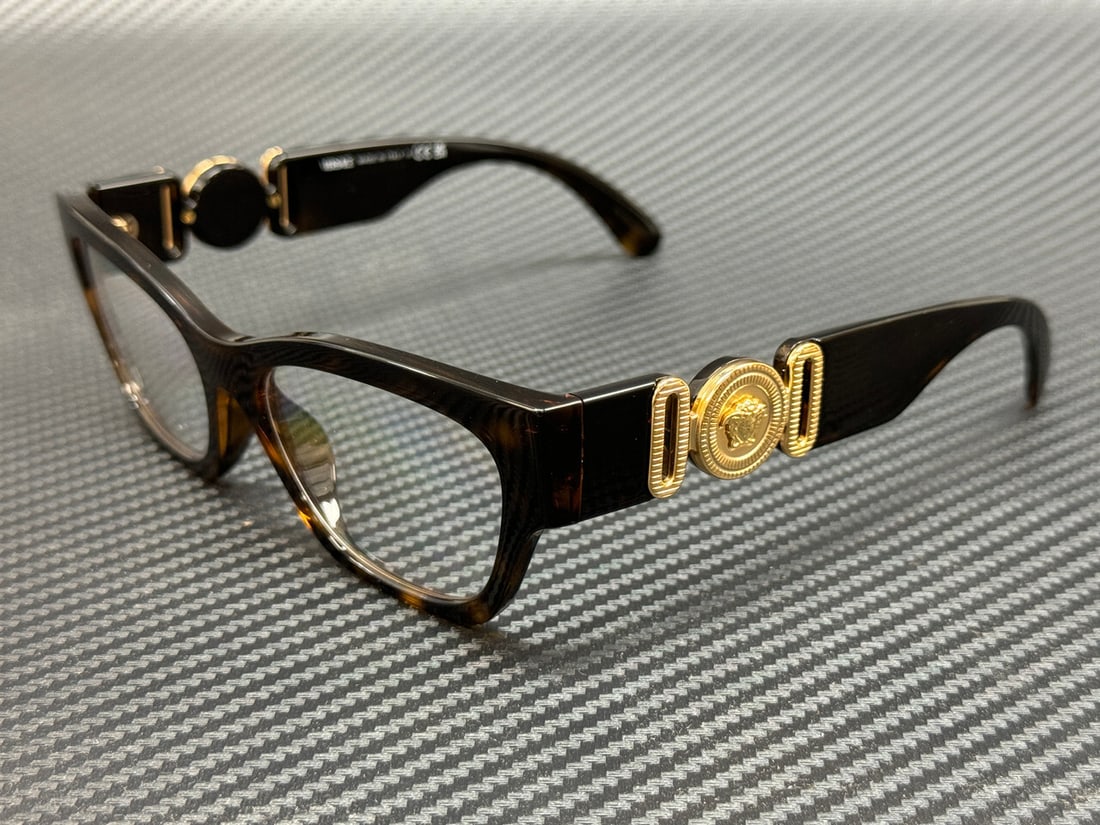 Versace VE3367U 108 Brown Havana Women's Eyeglasses with Authenticity Certificate: Versace VE3367U 108 Brown Havana Women's Eyeglasses with Authenticity Certificate Discover the elegance of Versace with these exquisite women's eyeglasses. The VE3367U model features a sophisticated B