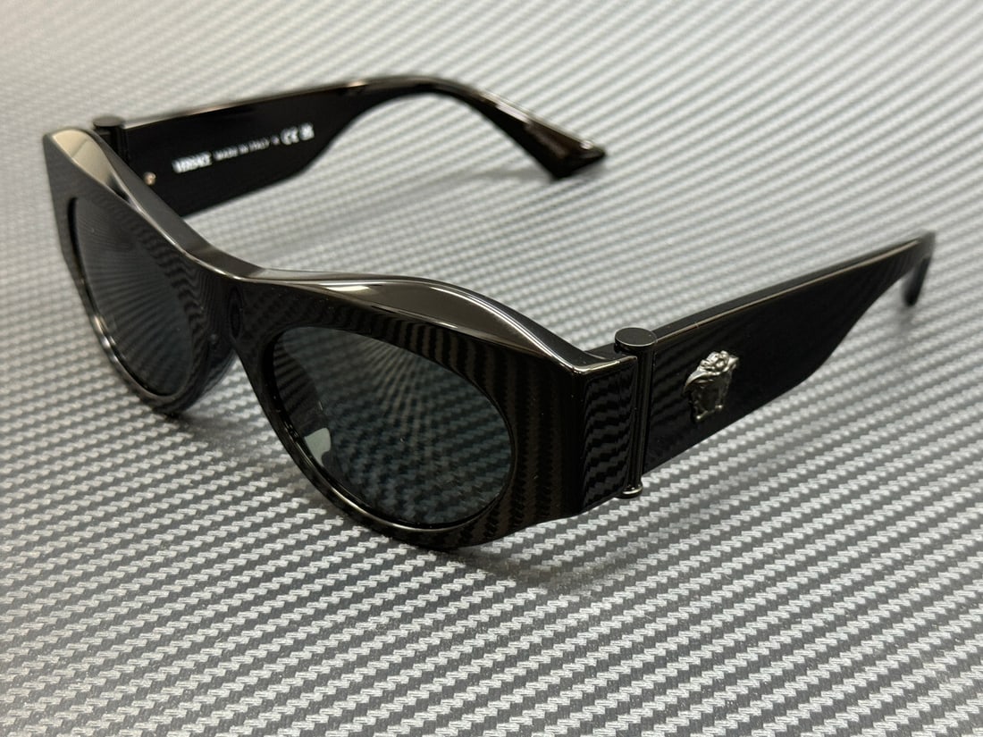 Versace VE4477U 536087 Women's Sunglasses Black Frame Grey Lenses: Versace VE4477U 536087 Women's Sunglasses Black Frame Grey Lenses Elevate your style with these chic Versace VE4477U 536087 sunglasses, designed for women. Featuring a sleek black frame and sophistica