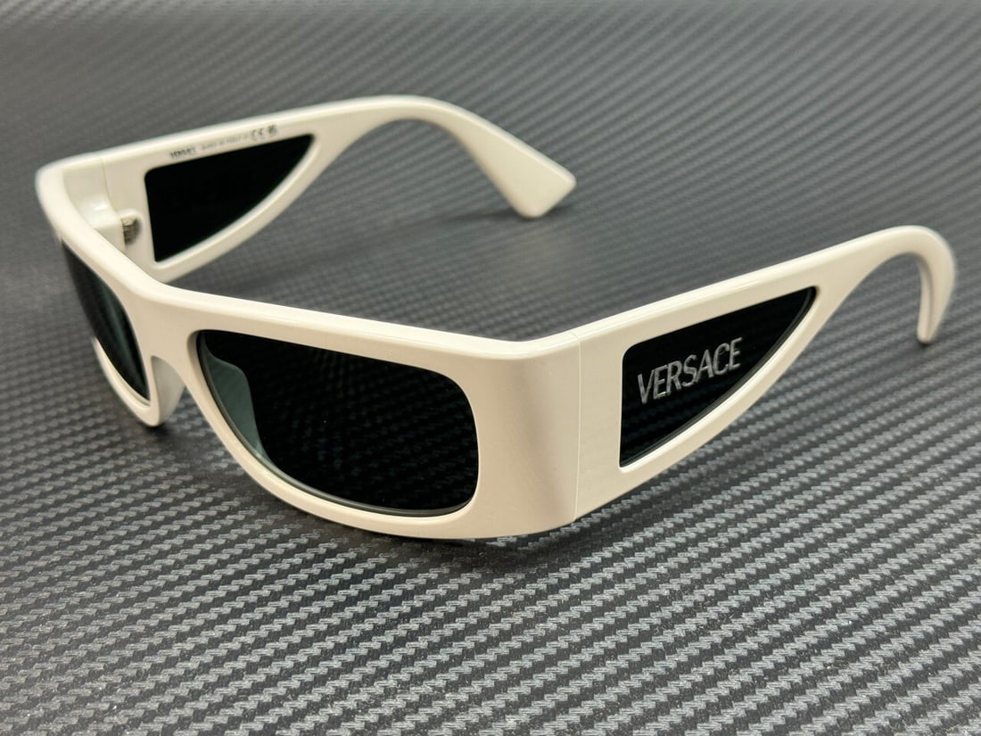 Versace VE4482 Men's Sunglasses White Frame Grey Lenses Authentic: Versace VE4482 Men's Sunglasses White Frame Grey Lenses Authentic Elevate your style with these VERSACE VE4482 sunglasses, designed for men. Featuring a sleek white frame and grey lenses, these sungla