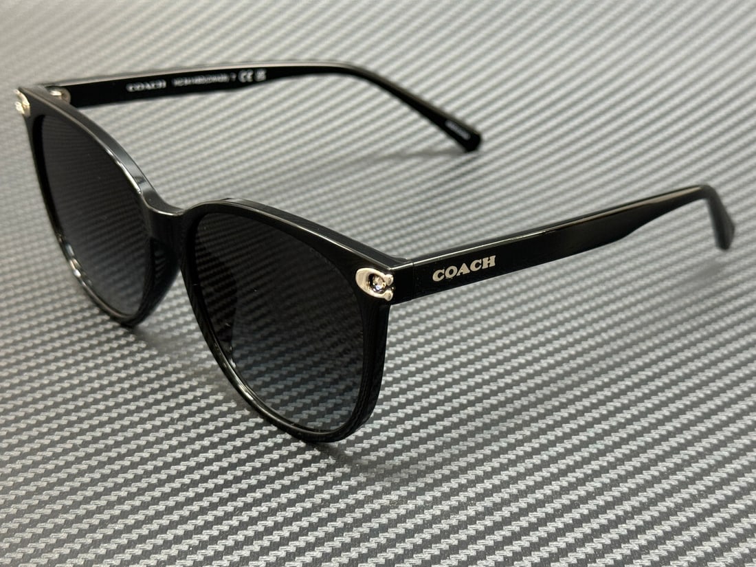 Coach HC8414BD 50023C Black Grey Gradient Women's Sunglasses: Coach HC8414BD 50023C Black Grey Gradient Women's Sunglasses Elevate your style with these stunning Coach HC8414BD 50023C women's sunglasses. Featuring a sleek black frame with grey gradient lenses, t