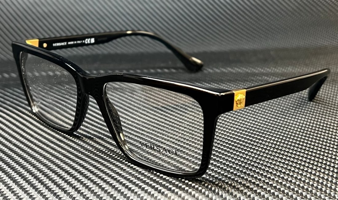 Versace VE3328 GB1 Black Gold Men's Eyeglasses with Demo Lens: Versace VE3328 GB1 Black Gold Men's Eyeglasses with Demo Lens Experience luxury and style with these Versace VE3328 GB1 eyeglasses. Featuring a sophisticated black and gold frame, these eyeglasses are